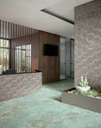 Closeup of entryway with blue green copper look porcelain tile floor