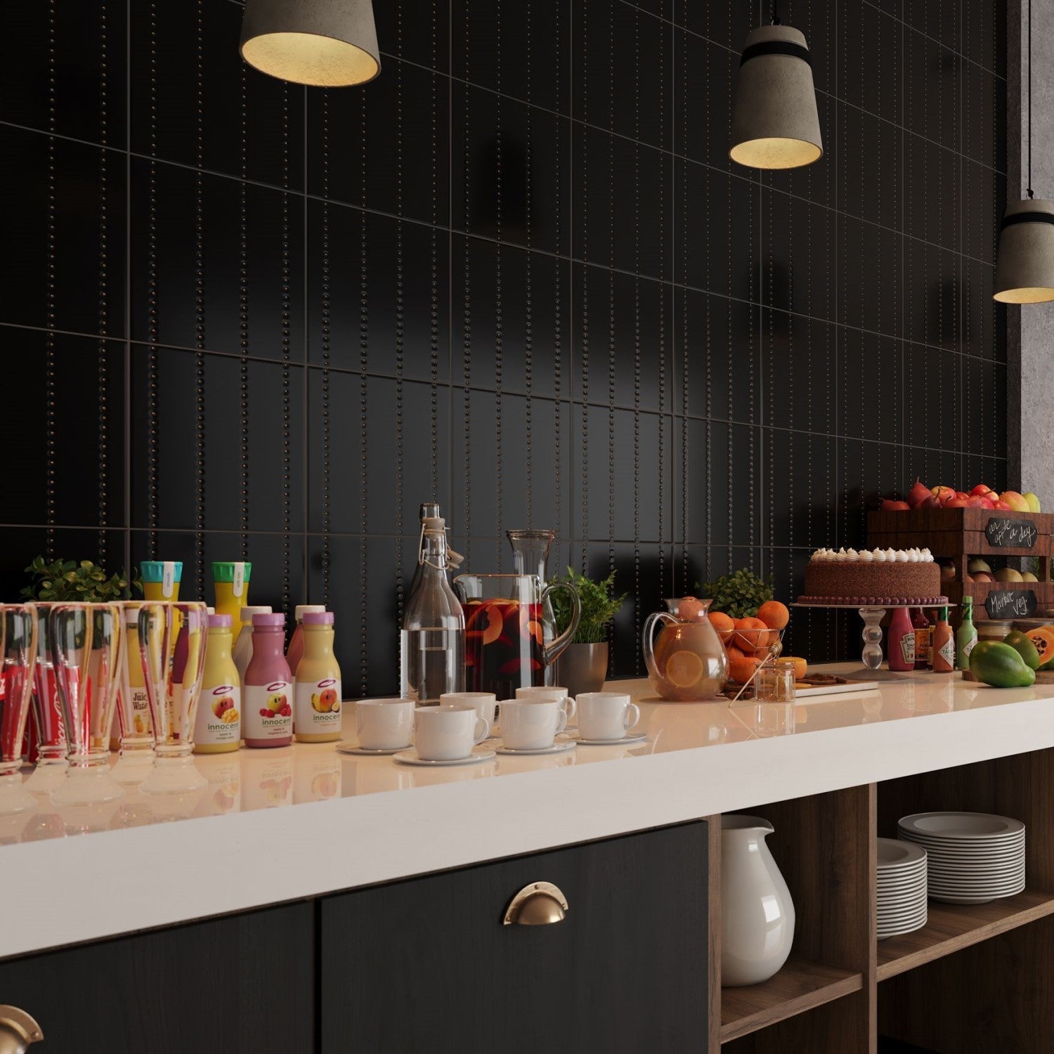 Kitchen counter with breakfast buffet spread in front of a black and gold tile backsplash