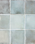 Nine bluish-gray 4x4 square tiles arranged in 3 rows.