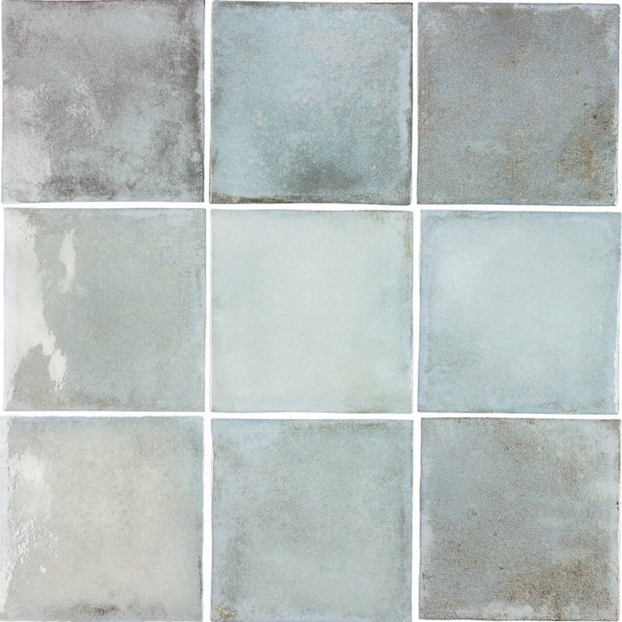 Nine bluish-gray 4x4 square tiles arranged in 3 rows.
