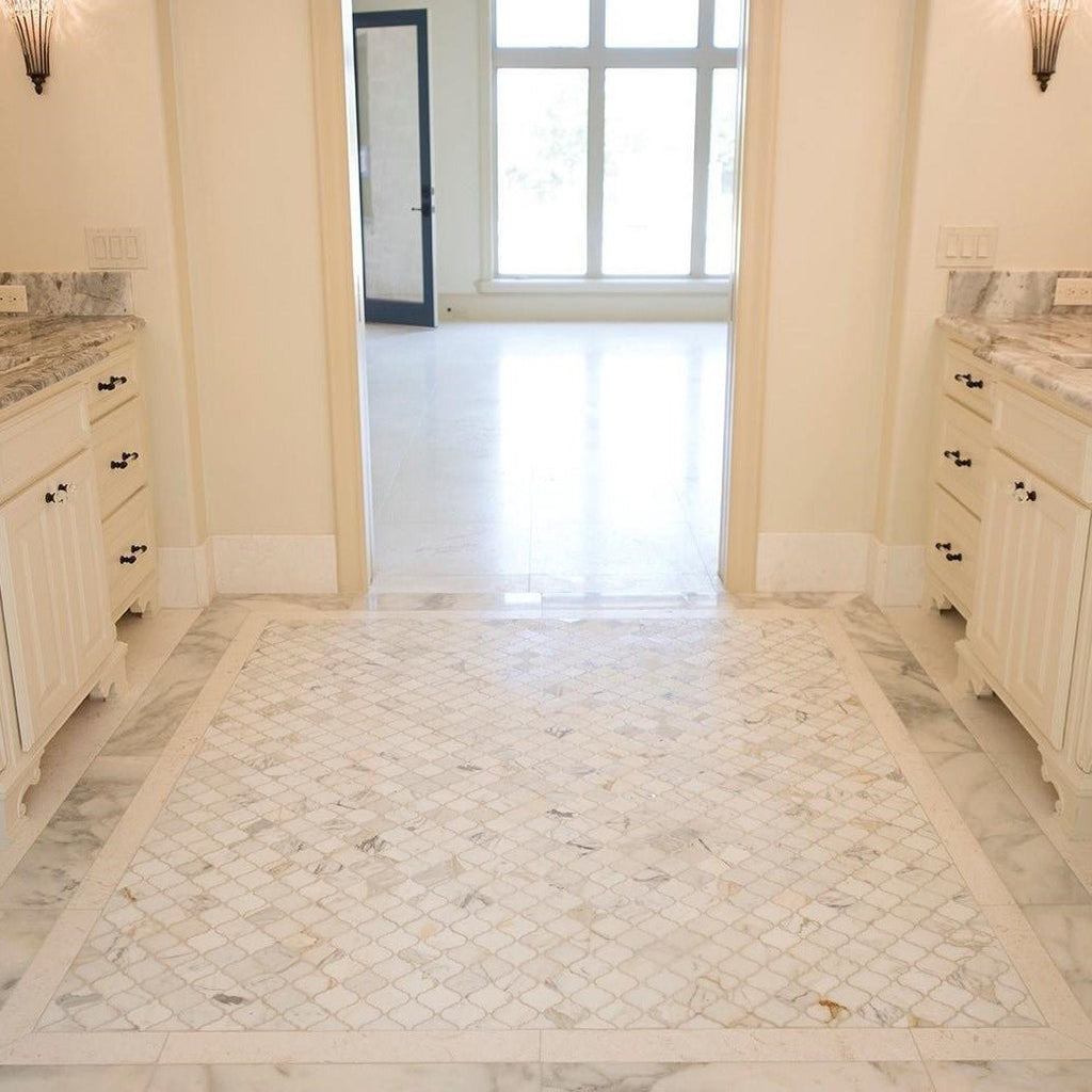 View of Calacatta Marble Arabesque Lantern Tile Bathroom Floor Between Two Vanities Facing Each Other