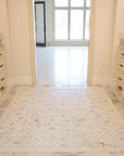 View of Calacatta Marble Arabesque Lantern Tile Bathroom Floor Between Two Vanities Facing Each Other