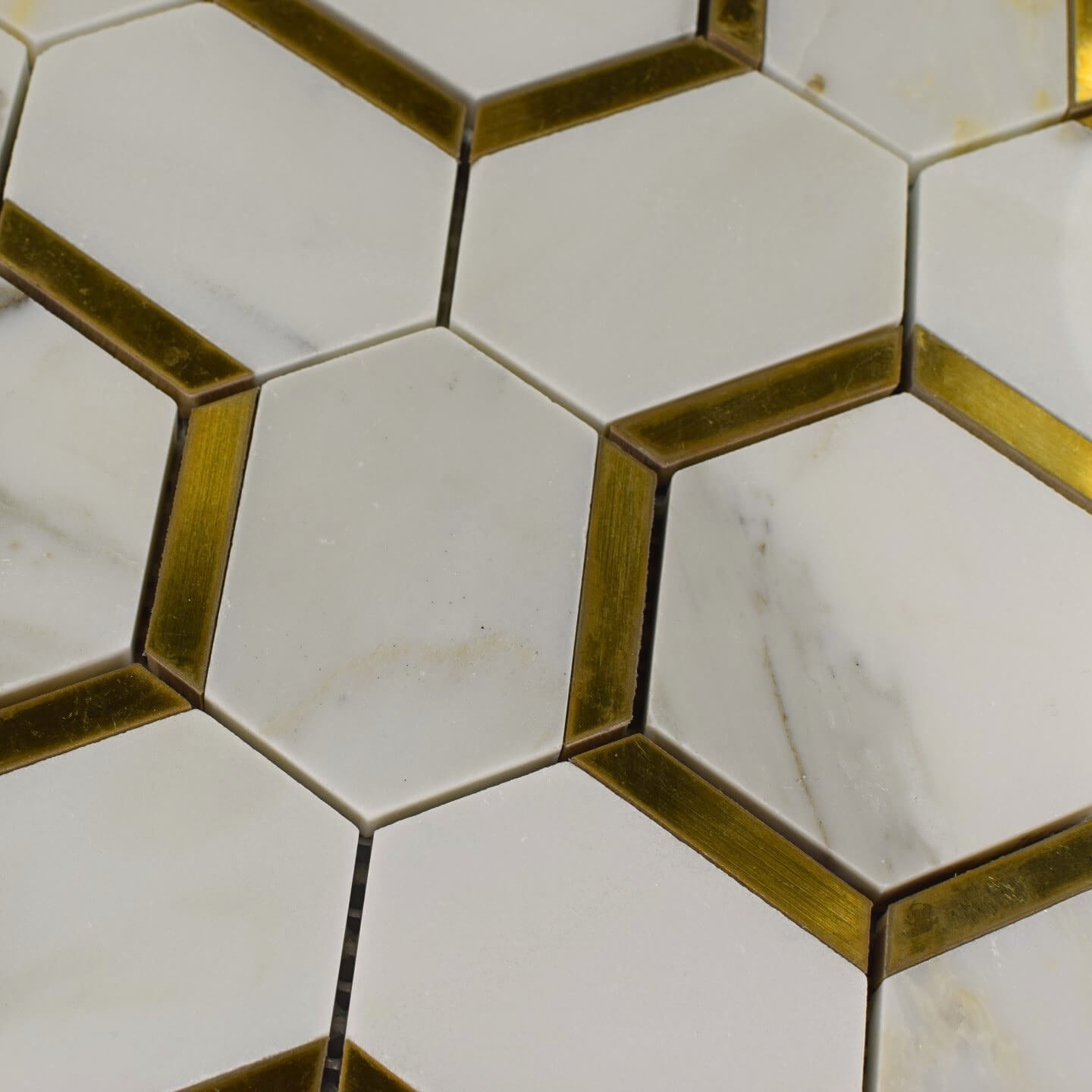 Calacatta Gold Marble with Gold Metal Waterjet Mosaic in Golden Hexagons - TileBuys