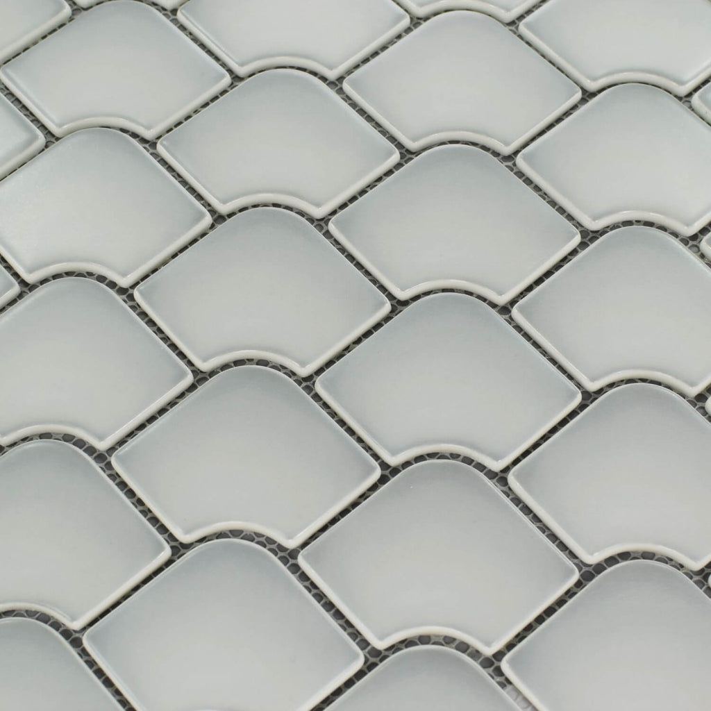 Closeup of matte glass mini fan mosaic tile in cotton white 