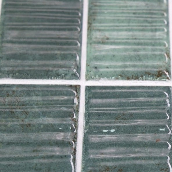 Closeup of Jade Green Textured Ceramic 2X8 Tiles