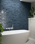 Bathroom with Distressed Blue Ceramic Picket Tile Wall and Freestanding White Tub
