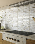 Stove area in kitchen with distressed white picket tile backsplash and wood cabinets