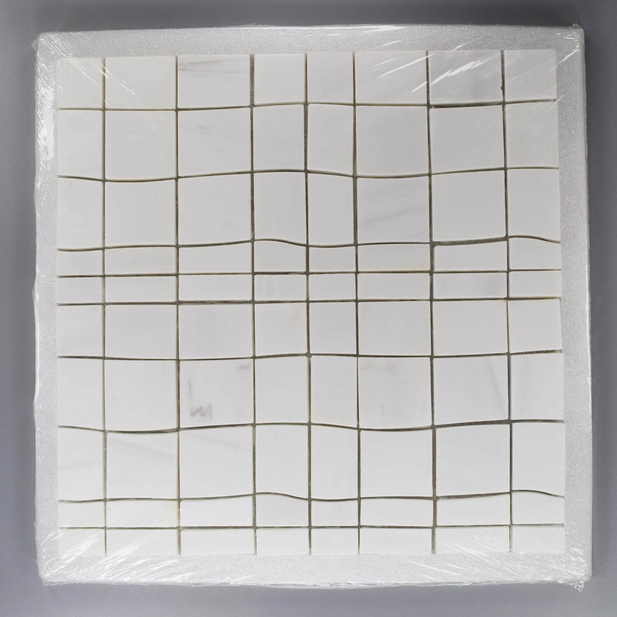 Dolomite White Irregular Squares Waterjet Mosaic Tile in Packaging