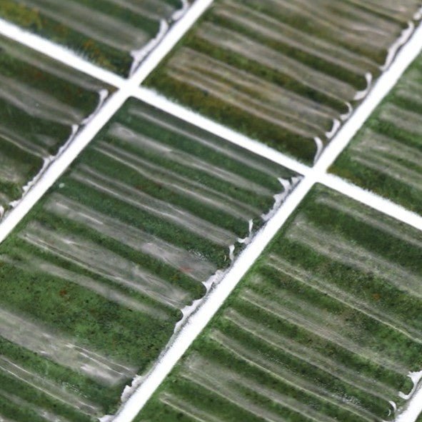 Closeup of Moss Green Textured Ceramic Subway Tiles