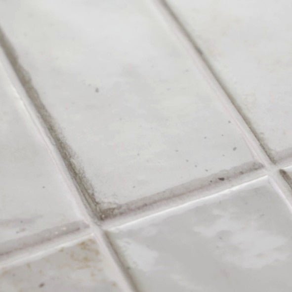 Closeup of White Ceramic 2x8 Subway Wall Tiles