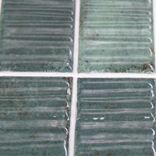 Closeup of Jade Green Textured Ceramic 2X8 Tiles