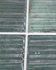 Closeup of Jade Green Textured Ceramic 2X8 Tiles