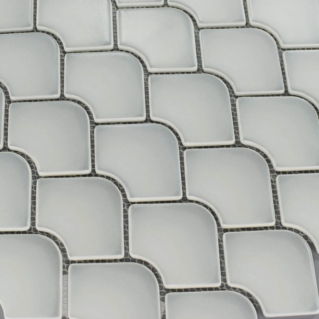 Closeup of matte glass mini fan mosaic tile in cotton white 