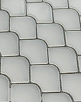 Closeup of matte glass mini fan mosaic tile in cotton white 
