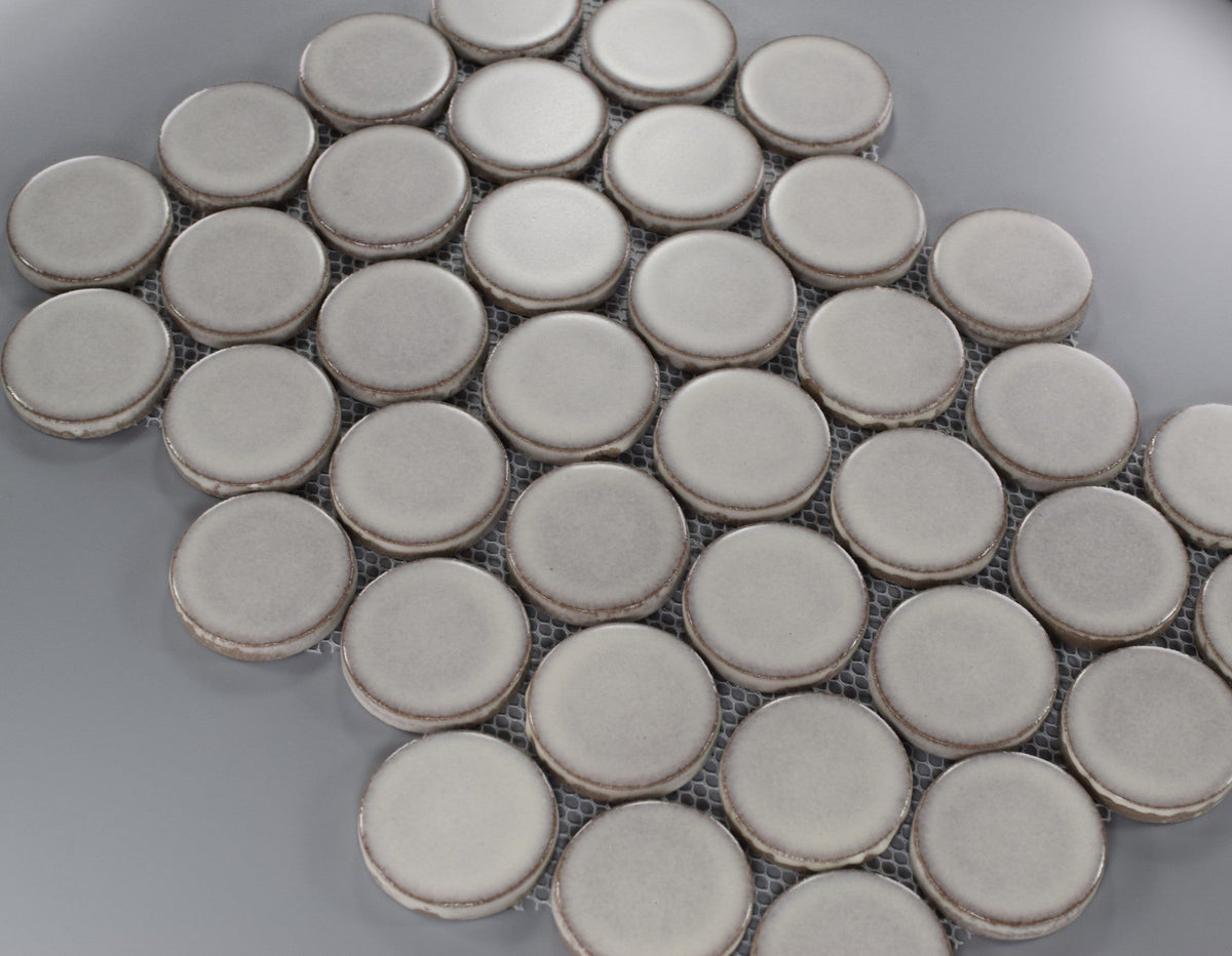 Closeup of Silver Gray Penny Rounds Mosaic Tile