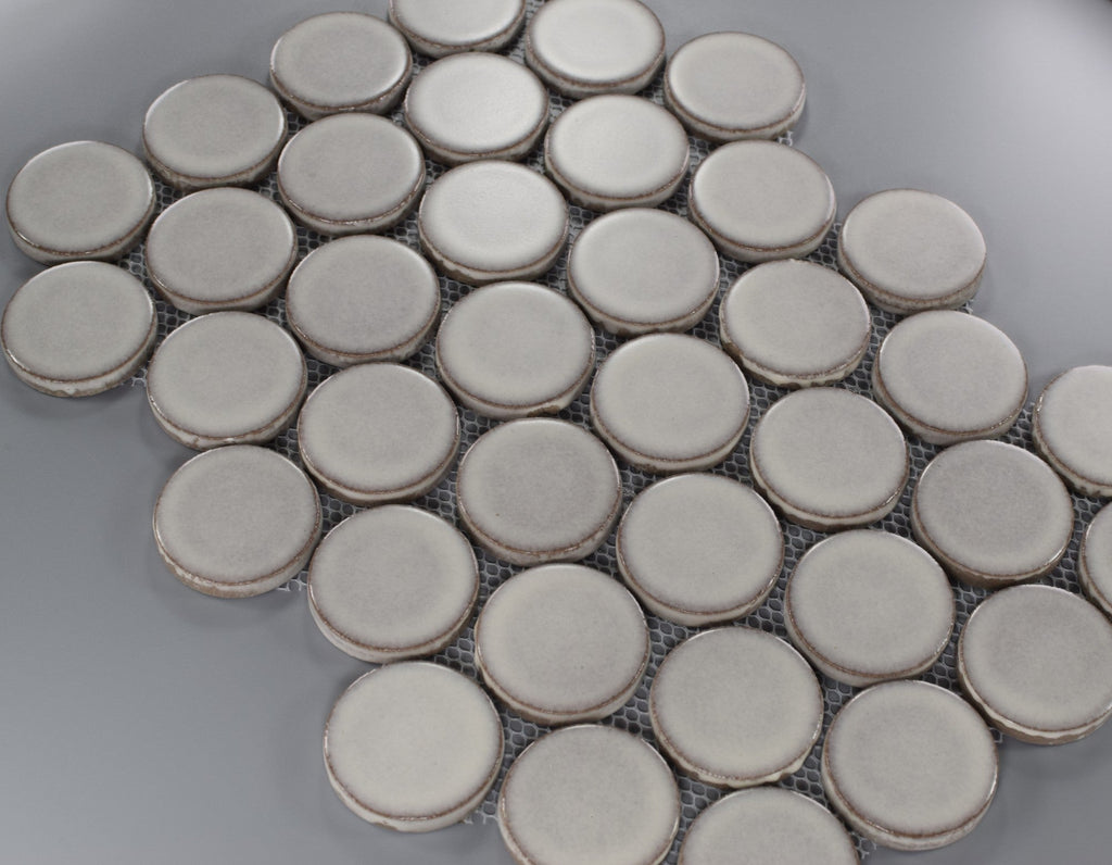 Closeup of Silver Gray Penny Rounds Mosaic Tile