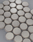 Closeup of Silver Gray Penny Rounds Mosaic Tile