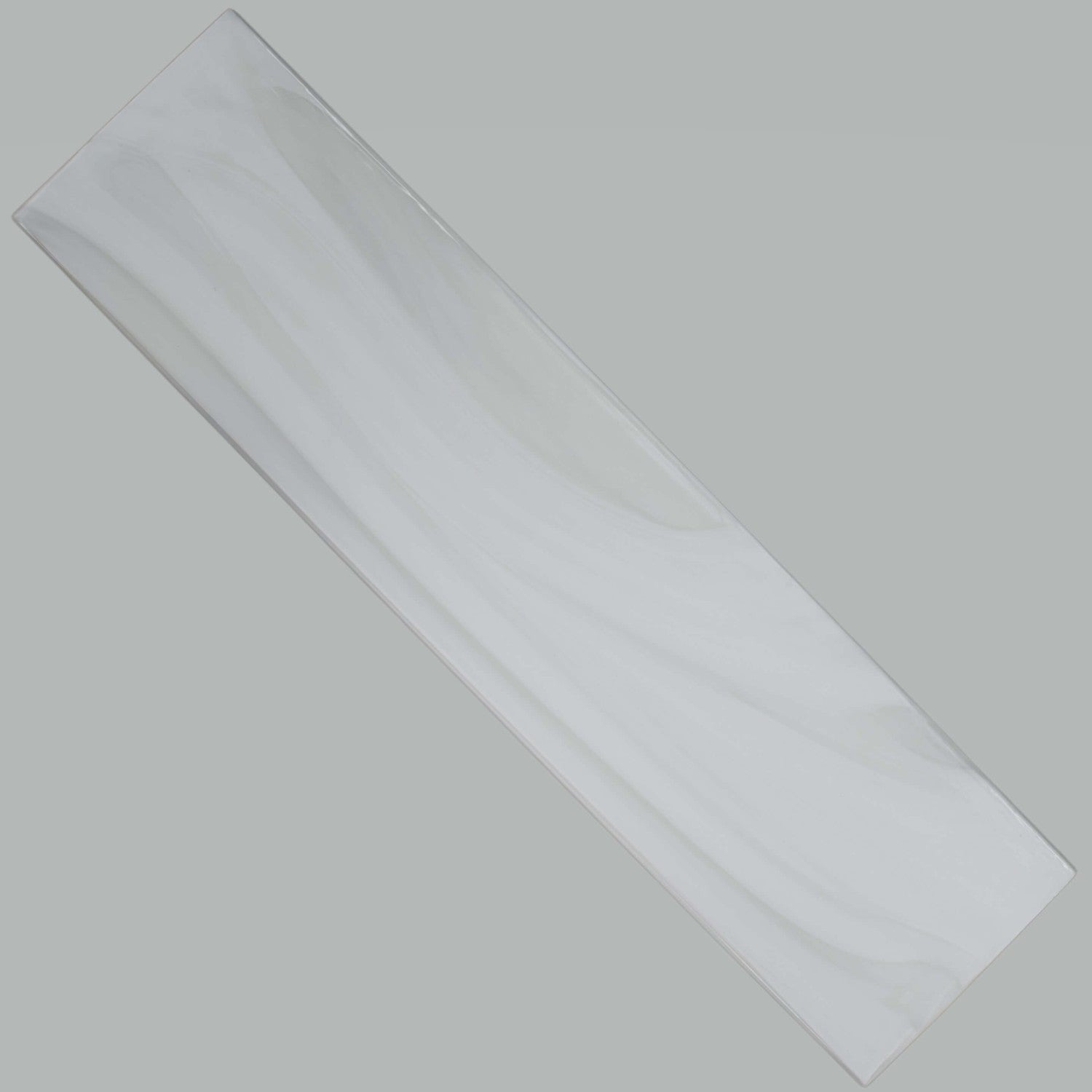 White Pearlescent Glazed Glass Subway Tile on Gray Background