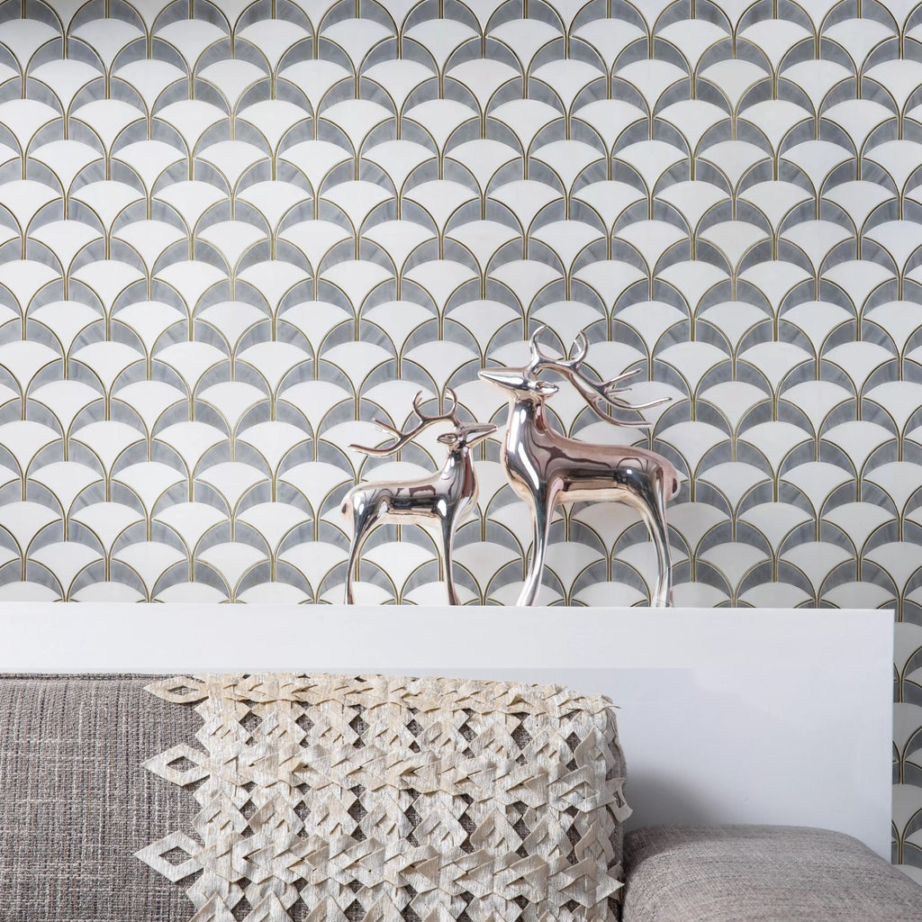 White and Gray Marble Scallop Tile Backsplash with Gold Brass Accents
