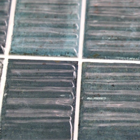 Closeup of Turquoise Textured 2x8 Subway Wall Tiles