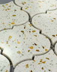 Closeup of White and Gold Terrazzo Arabesque Lantern Mosaic Tile