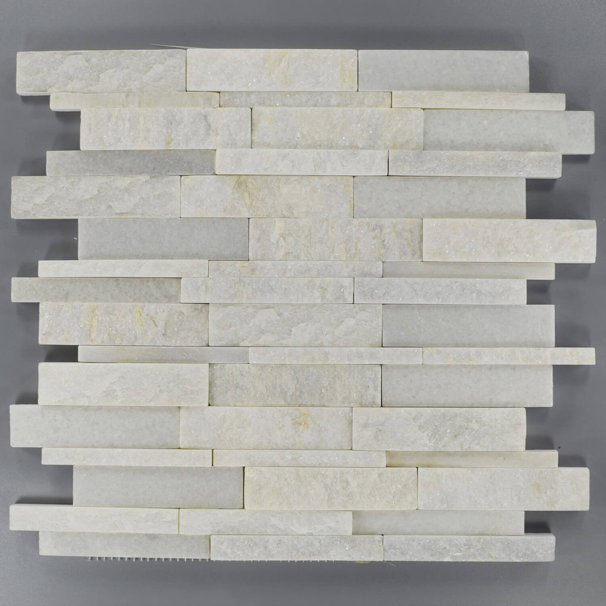 White Slate and Quartzite Stacked Stone Tile on Gray Background