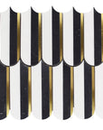 Closeup of White Thassos, Nero Marquina Black Marble, and Brass Elongated Scallop Waterjet Mosaic Tile
