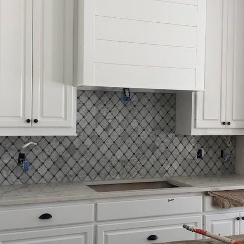 Carrara White Waterjet Mosaic Tile with Grey Marble Accent Dots in Safi Lanterns | TileBuys