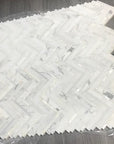 Calacatta (Calcutta) Marble and Mother of Pearl Waterjet Mosaic Tile in Deluxe Herringbone | TileBuys