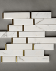 Calacatta Marble Skinny Tile Backsplash with Gold Accent | TileBuys