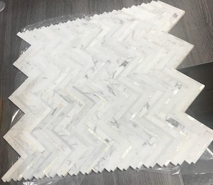 Calacatta (Calcutta) Marble and Mother of Pearl Waterjet Mosaic Tile in Deluxe Herringbone | TileBuys