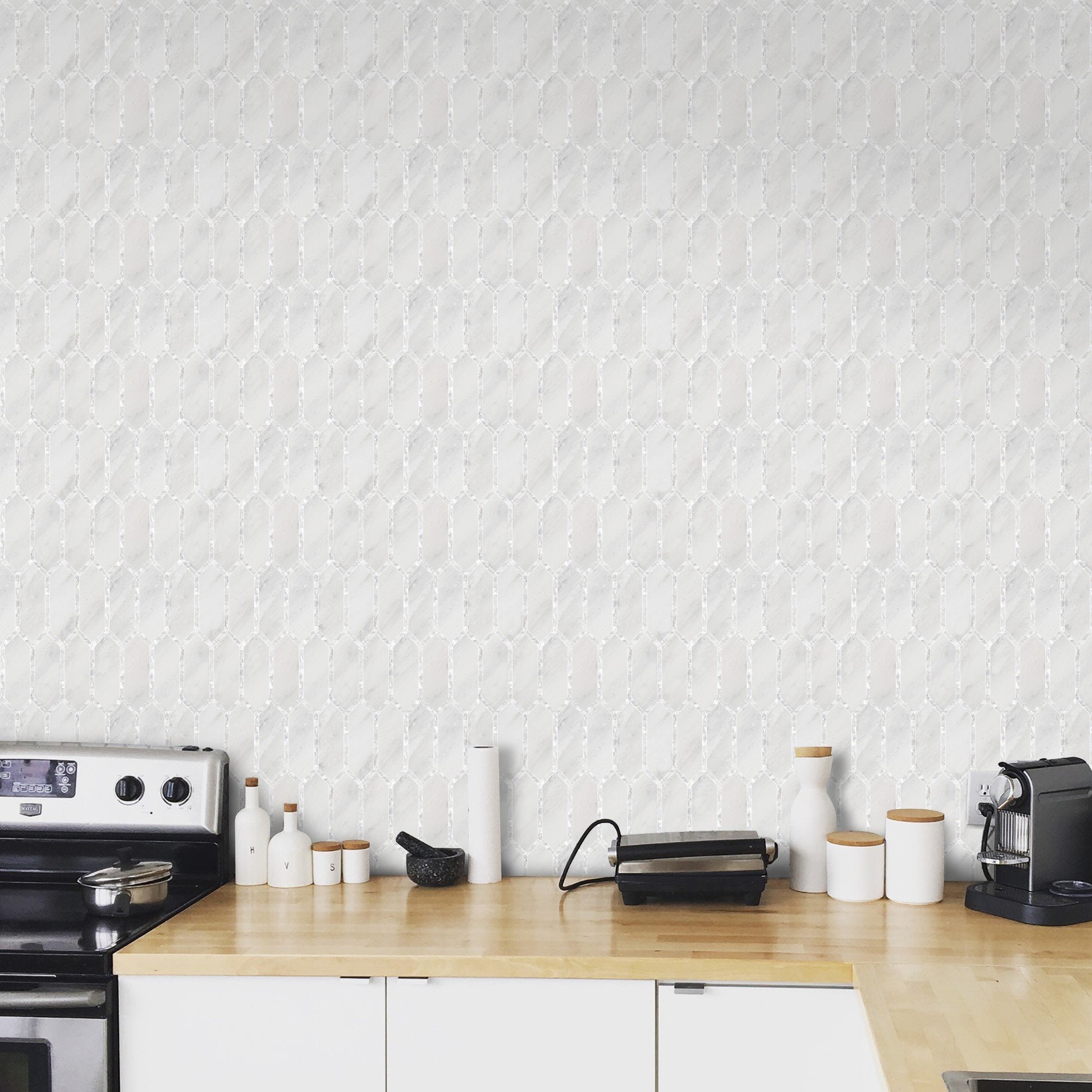 The elegant elongated hexagon style picket marble tile gets an added ...